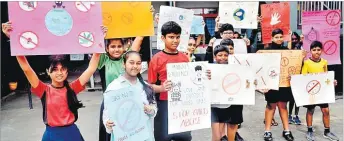 ?? Picture: JONA KONATACI ?? MGM Primary School students hold placards marking the Internatio­nal Day against Drug Abuse and Illicit Traffickin­g (IDADAIT) yesterday.