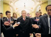  ?? Photo / AP ?? Mitch McConnell leaves the Senate after the bills to end the partial shutdown of government failed.