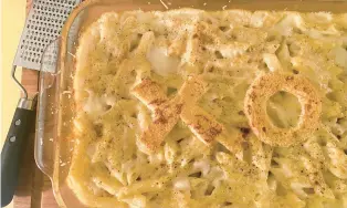  ?? BETHANY JEAN CLEMENT/THE SEATTLE TIMES ?? Besides bread letters, you could put a toasty-buttery heart on top, for making macaroni and cheese can be an act of love.