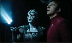  ?? KIMBERLEY FRENCH — PARAMOUNT PICTURES VIA AP ?? In this image provided by Paramount Pictures, Sofia Boutella, left, plays Jaylah and Simon Pegg plays Scotty in Star Trek Beyond. “Star Trek Beyond” has landed atop the weekend box office. According to studio estimates Sunday the latest outing for the...