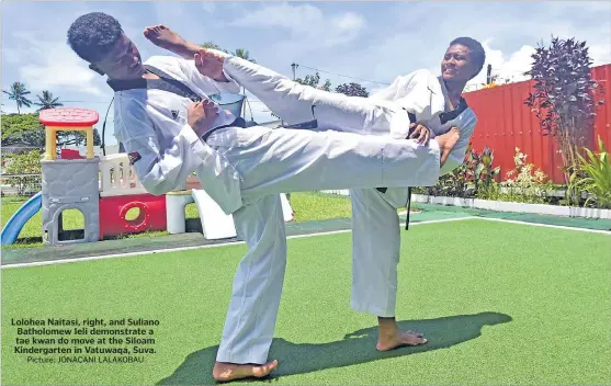  ?? Picture: JONACANI LALAKOBAU ?? Lolohea Naitasi, right, and Suliano Batholomew Ieli demonstrat­e a tae kwan do move at the Siloam Kindergart­en in Vatuwaqa, Suva.