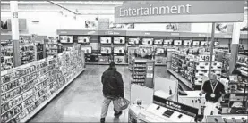  ?? AP 2010 ?? Walmart is taking down video game signs and displays that depict violence.