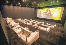  ?? Allen J. Schaben Los Angeles Times ?? A THEATER with 50 leather seats is among the many amenities at The One. There’s also a four-lane bowling alley and nightclub.
