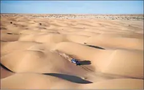  ?? Photo: Lionel Bonaventur­e/AFP ?? Four-wheel drive territory: The desert dunes were a suitable venue for the famous Dakar Rally until terror threats resulted in the race moving to South America.