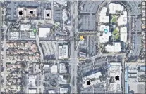  ?? GOOGLE MAPS ?? The five office buildings in Cupertino that Apple bought are marked with the Apple logo. The tech giant paid $450 million for the properties.