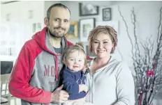  ?? BOB TYMCZYSZYN/STANDARD FILE PHOTO ?? Phil Secord, who was diagnosed with a rare form of leukemia and whose saga this newspaper has been reporting to readers, has died. He is pictured here with his wife Amberley Gaspich and daughter Ellie,