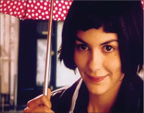  ?? ?? Audrey Tatou was 23 years old when she rose to internatio­nal fame for the iconic role of the painfully shy covert do-gooder Amélie in Jean-Pierre Jeunet’s 2001 film.