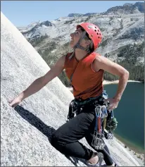  ?? (Photo: Adobe Stock) ?? A climber tests her skills on the monoliths above Tenaya Lake.