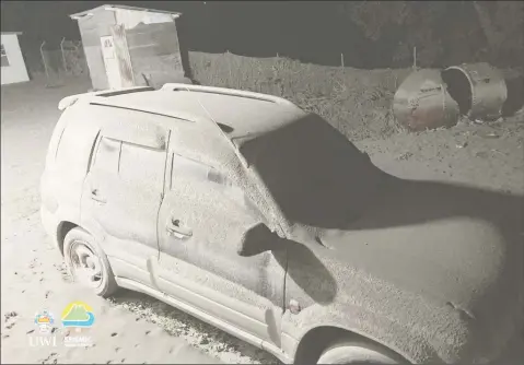  ??  ?? A vehicle covered in ash. (Photo taken from the UWI Seismic Research Centre Facebook page, credit: Prof Robertson, UWI-SRC)