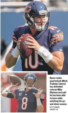  ?? GETTY IMAGES ( ABOVE), AP ?? Bears rookie quarterbac­k Mitch Trubisky ( above) has defended veteran Mike Glennon and said he has been able to learn while watching his upanddown season.
