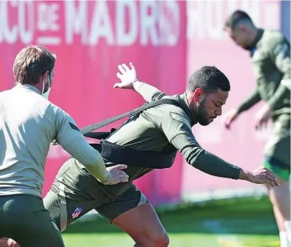  ?? EFE/ATLÉTICO DE MADRID ?? Lodi, sustituido en el Pizjuán a la media hora, en el entrenamie­nto de ayer del Atlético