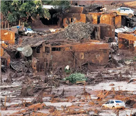  ??  ?? The village of Bento Rodrigues, in Brazil, was destroyed when a dam holding back waste water burst at the site of the Samarco mining company, owned by BHP and Vale