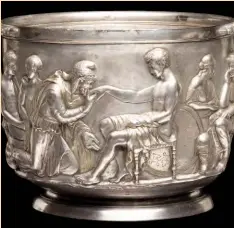  ??  ?? Right: On one of two Roman silver cups from Hoby, Denmark, Priam kisses Achilles’ hand, begging for the body of his son, Hector (first century ad, 13.5cm across)