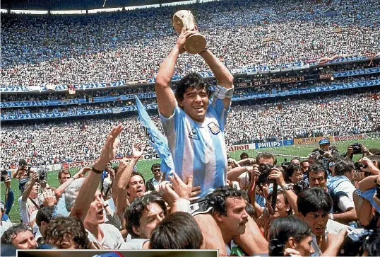  ?? AP/GETTY IMAGES ?? Diego Maradona with the Fifa World Cup in 1986 and, left, in Argentina in November last year. He has died of a heart attack, aged 60.