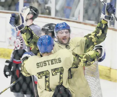  ??  ?? Peterborou­gh Phantoms players celebrate another super Sunday success at Planet Ice.