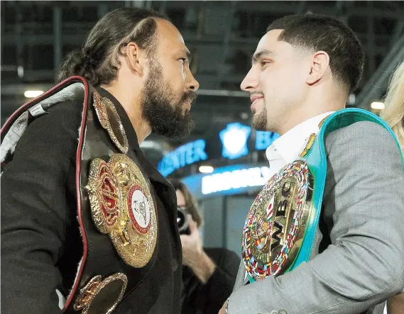  ??  ?? El campeón welter AMB, Keith Thurman, y su homólogo del CMB, Danny García, se encaran en la primera conferenci­a de prensa del combate.