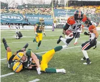  ?? JASON FRANSON THE CANADIAN PRESS FILE PHOTO ?? In this Oct. 12, 2019, photo, B.C. Lions’ Ryan Lankford leaps past Eskimos defenders in Edmonton. Answers are sought by teams and players alike as the Canadian Football League struggles for its very survival due to the COVID-19 pandemic.