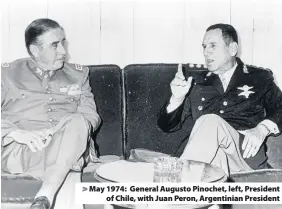  ??  ?? > May 1974: General Augusto Pinochet, left, President of Chile, with Juan Peron, Argentinia­n President