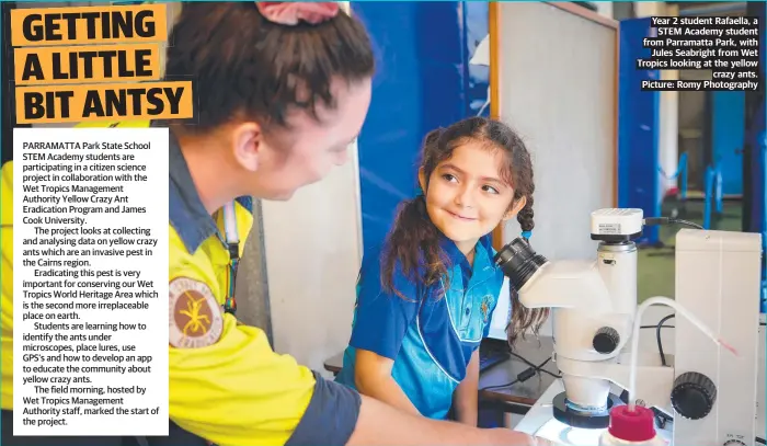  ?? Picture: Romy Photograph­y ?? Year 2 student Rafaella, a STEM Academy student from Parramatta Park, with Jules Seabright from Wet Tropics looking at the yellow crazy ants.
