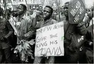  ?? ?? IFP supporters march through Johannesbu­rg in the run-up to the 1994 elections.