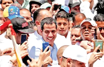  ??  ?? Guaido attends a rally against Maduro’s government in Caracas. — Reuters photo