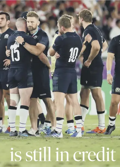  ??  ?? 0 Scotland players at fulltime after their defeat by Japan. Below, SRU chief Mark Dodson, who is unlikely to dismiss Townsend at this juncture.