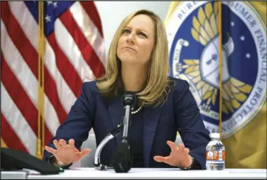  ?? ASSOCIATED PRESS ?? In this Dec. 11, 2018, file photo, Consumer Financial Protection Bureau Director Kathy Kraninger pauses as she speaks to media at the CFPB offices in Washington. In April, the bureau broadened the scope for what it considers to be abusive behavior by providers of financial services or products to consumers.