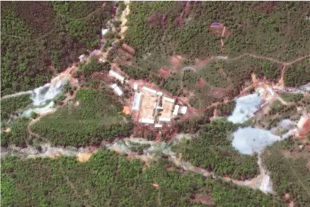  ?? Reuter-Yonhap ?? North Korea’s Punggye-ri nuclear test facility in North Hamgyong Province is shown in this DigitalGlo­be satellite image taken May 23. The state demolished the site Thursday in the presence of foreign journalist­s, in what it claims was its first step...
