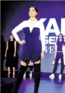  ?? Photo — AFP ?? In this file shows Bollywood actress Sonam Kapoor Ahuja stands on the stage during the launch of capsule collection of Karl Lagerfeld in Mumbai.