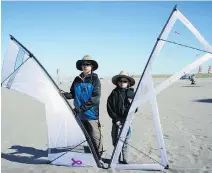  ?? PV NGUYEN/THE ASSOCIATED PRESS ?? Dylan Nguyen, left, and Cardin Nguyen enjoy flying their kites and taking part in competitio­ns.