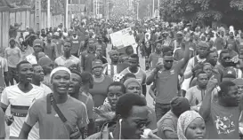  ??  ?? Thousands take to the streets in Togo to demand the reinstatem­ent of the 1992 constituti­on. Authoritie­s have often responded to the protests by blocking mobile and internet communicat­ion. Mobile access to the internet was blocked on Wednesday by...