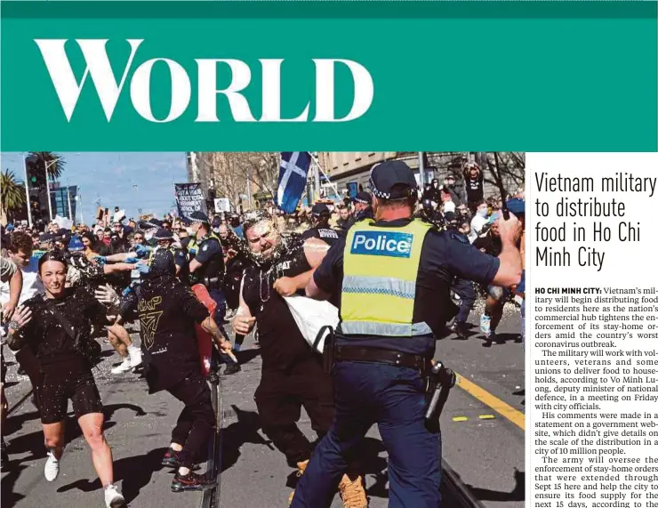  ?? AFP PIC ?? Police pepper spraying protesters during an anti-lockdown rally in Melbourne yesterday, amid the city’s sixth lockdown to contain a Covid-19 outbreak.