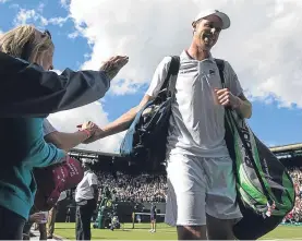  ??  ?? American Sam Querrey shows his delight yesterday.