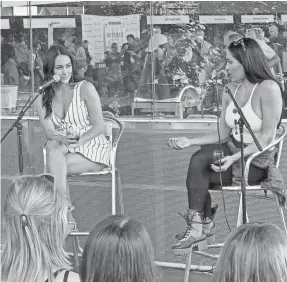  ?? USA TODAY WINE & FOOD EXPERIENCE ?? Brie, left, and Nikki Bella meet fans during “Wine Down with the Bella Twins” Q&A on Saturday in Brooklyn.