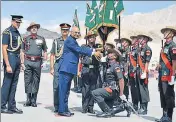  ??  ?? President Ram Nath Kovind presents Presidenti­al Colours to the Ladakh Scouts Regiment at Leh on Monday. HT PHOTO