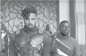  ?? MARVEL ?? Erik Killmonger (Michael B. Jordan, left, with Daniel Kaluuya) emerges as a formidable and resonant enemy to Wakanda’s ruler in “Black Panther.”