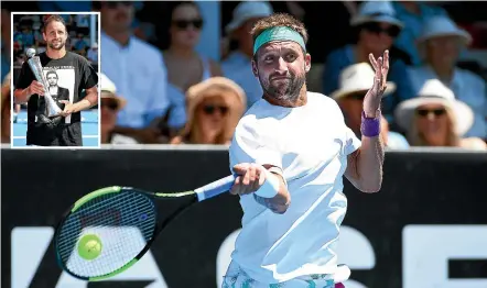  ?? PHOTOSPORT ?? Tennys Sandgren attacks with a forehand shot during the ASB Classic final against Cameron Norrie.