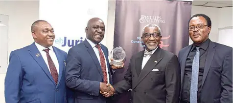  ??  ?? Senior Partner, Phillips Consulting, Seun Ngonnase(left); Head, Informatio­n Technology, Nigerian Communicat­ions Commission (NCC) Abraham Oshadami; Chairman, Phillips Consulting, Foluso Phillips; and Lagos Zonal Controller, NCC, Kenneth Uzoekwe, during the Web Jurist award ceremony in which NCC won Best Website Award in Ministries, Department­s and Agencies (MDA) category in Lagos.
