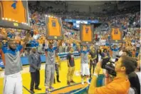  ?? UNIVERSITY OF FLORIDA PHOTO ?? Tennessee on Monday became the first SEC men’s basketball program other than Kentucky to earn an Associated Press No. 1 ranking since the 2013-14 Florida Gators, who were led by the senior quartet of Patric Young (4), Will Yeguete (15), Scottie Wilbekin (5) and Casey Prather (24).