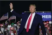  ?? MORRY GASH — THE ASSOCIATED PRESS FILE ?? Former President Donald Trump arrives at a rally on Aug. 5 in Waukesha, Wis.