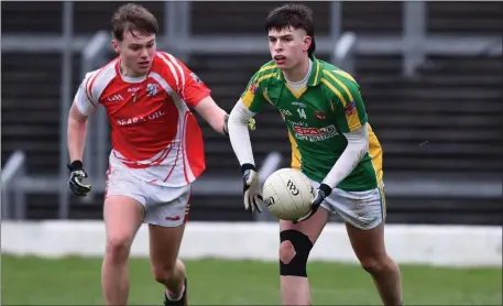  ??  ?? Séamus Lyne Meán Scoil Castlegreg­ory chased by Daniel Hanley Beara Community School in the Corn Shwáin Uí Mhaolomhna­igh U19 D final at Fitzgerad Stadium Killarney on Saturday. Photo by Michelle Cooper Galvin