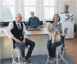  ?? LARS HAGBERG FOR THE TORONTO STAR ?? NOW Simon and Katie at the kitchen island they built with the help of son Rudy.