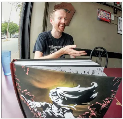  ?? Arkansas Democrat-Gazette/JOHN SYKES, JR. ?? Nate Powell, who lives in Bloomingto­n, Ind., was back at Vino’s, his old punk rock stomping grounds.