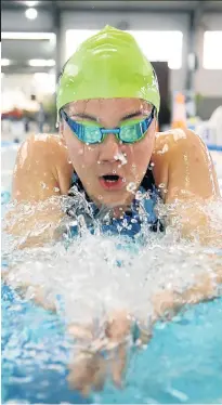  ?? Picture: JACKIE CAUSEN ?? LIVING HER DREAM: Partially sighted swimmer Alani Ferreira had to skip her matric dance to qualify for the Paralympic­s