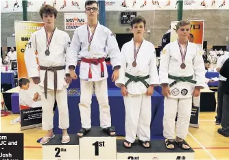  ??  ?? Judoka from Battlehill JC and Seghill JC including Josh Stoneman (above right) - topped the podium four times in Kettering