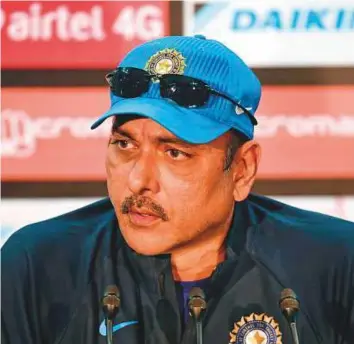  ?? AFP ?? Ravi Shastri agreed to apply for the post of coach after initial reluctance, and only on getting assurance from the BCCI about getting the post.