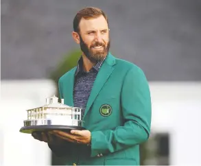  ?? ROB CARR / GETTY IMAGES ?? Dustin Johnson not only proved his mettle to golf watchers with his victory at the
Masters Sunday in Augusta, Georgia, he proved it to himself as well.