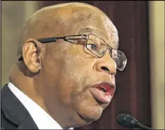  ?? MARK WILSON / GETTY IMAGES ?? U.S. Rep. John Lewis, D-Atlanta, called President-elect Donald Trump’s presidency illegitima­te, to which Trump responded by saying Lewis’ district is in “horrible shape” and “falling apart.”