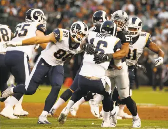  ?? Santiago Mejia / The Chronicle ?? Jared Goff gets sacked by Raiders defensive end Khalil Mack (52) during a first half in which Oakland’s otherwise porous defense allowed Goff to lead two scoring drives.