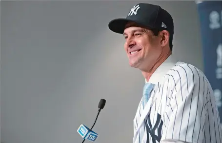  ?? MARY ALTAFFER/AP PHOTO ?? Aaron Boone smiles as he speaks to reporters during a press conference Wednesday at Yankee Stadium in New York where he was officially introduced as manager of the Yankees.